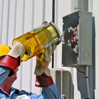 Lineman using a meter puller