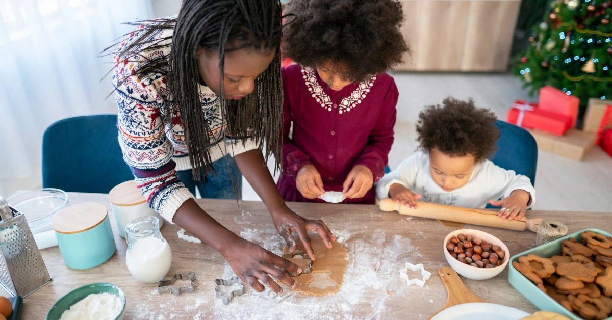 mother making cookies with children