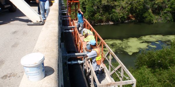 workers building a road bridge