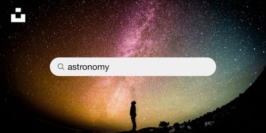 Silhouette stargazing under a colorful Milky Way sky with 'astronomy' search bar.