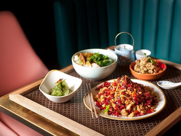 Spicy chicken Asian style menu served on a bamboo table