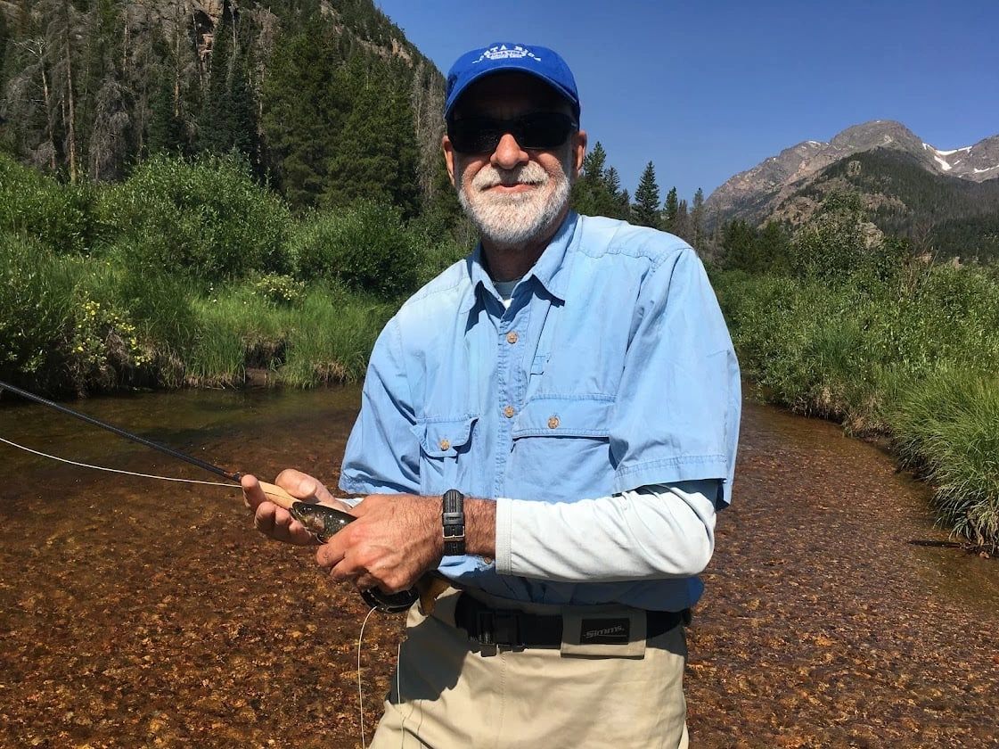 Lee Swidler fly fishing in a mountain trout stream before his Costa Rica river years