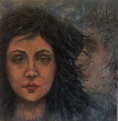 Portrait of a woman with intense eyes and dark hair.