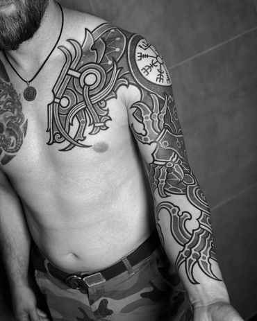 nordic wolf tattoo, viking tattoo arm, tattoo by Pierre Marcel tattoos, Munich, Germany. Bali