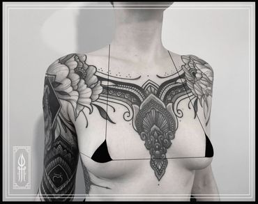 Cover up ornamental chest piece tattoo by Pierre marcel, Munich, Germany.