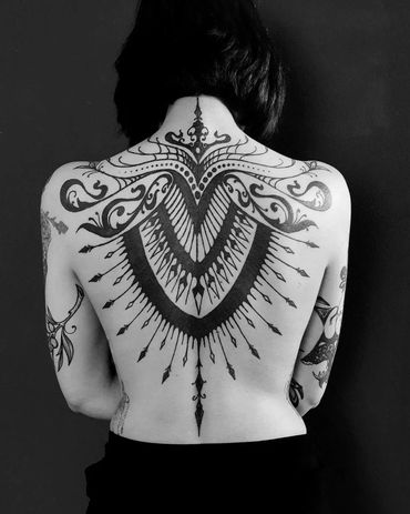 Abstract blackwork flower tattoo by Pierre marcel, Munich, Germany.