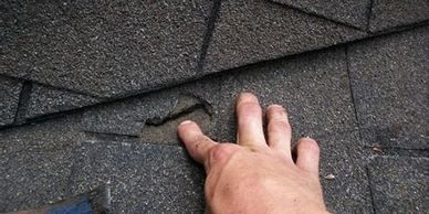 Damaged shingles may lead to hidden leaks and costly repairs. Regular inspections are crucial.