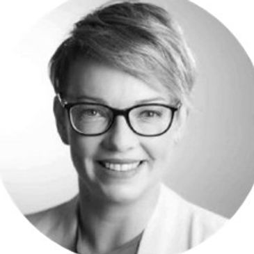 Dr. Renee Hamilton Wearing eyeglass and smiling with looking ahead