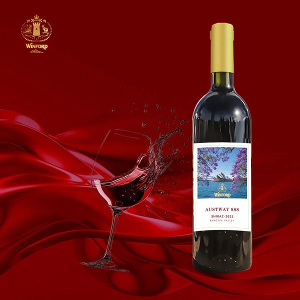 Elegant bottle of Austway 888 Shiraz 2023 with a splash of wine in a glass on a red silk background.