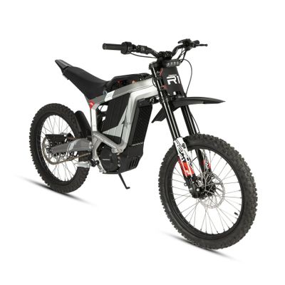 Sleek black and silver electric dirt bike with rugged tires.