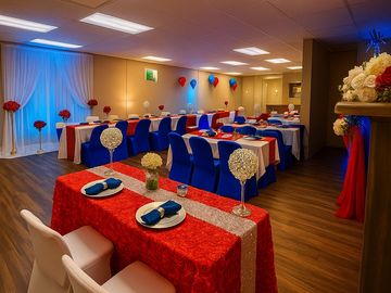 Multiple tables set up for a 4th of July event Seats up to 40 people