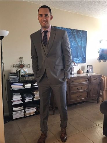 Man standing in his 3-piece suit shirt and tie set brand new tailored to fit