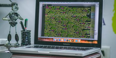 coding on screen of laptop