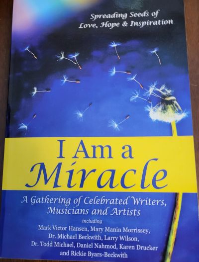 Book cover titled I Am a Miracle with dandelion seeds.