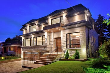 A refined transitional-style custom home featuring warm finishes, balanced architectural lines, and 