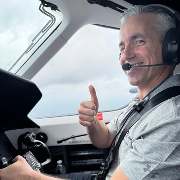 Appraiser flying an airplane