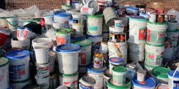 A bunch of paint containers that Junkosaur is happy to remove.