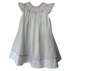 White and pink baby dress with frill sleeves.
