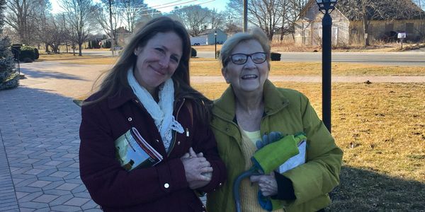 Elderly client receives assistance while running errands from caregiver