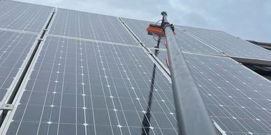 Solar Panel being Cleaned with high quality equipment by First Choice Exterior Solutions in Sydney