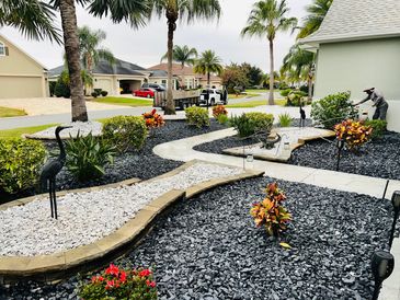 Plants low maintenance, decorative rocks and decorative retaining  walls