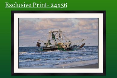 Fishing boat sailing on the ocean under a cloudy sky.