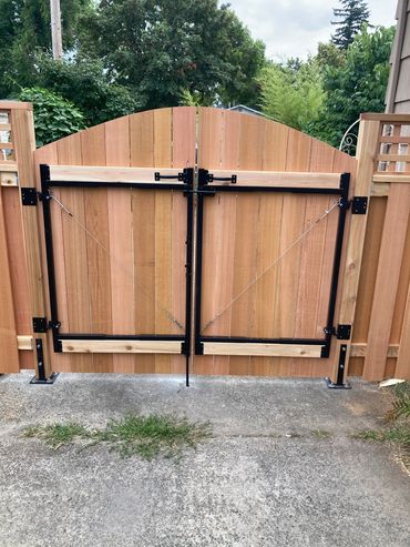 Back view double drive solid style gates 
Portland Oregon cedar fence and gate installation 