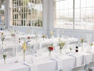 bud vase centerpieces seasonal blooms in pastel, bright flowers Fort Mason Center San Francisco, CA