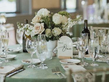Garden-style blush and ivory centerpiece white vase Oceano Hotel and Spa wedding Half Moon Bay, CA