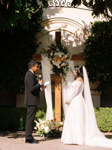 Wooden cross wedding arch with drapes and flowers Christian wedding cross flower Casa Real Livermore
