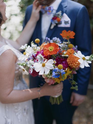 Bridal bouquet of cosmos, poppies, dahlias, delphiniums Green Mountain Retreat Center Los Gatos, CA