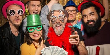 Group fun with live photo booth props hats and glasses