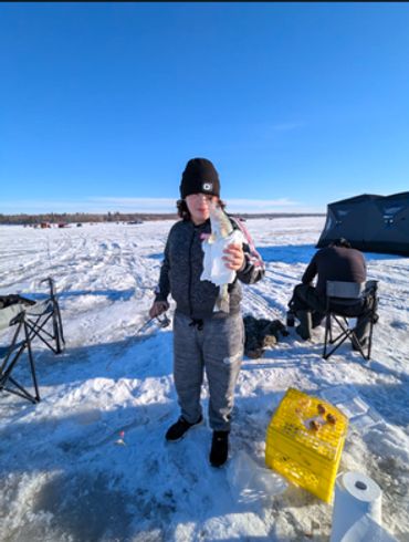 Proud of her first fish caught.