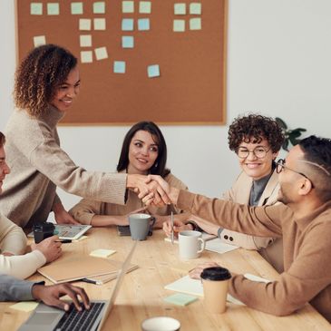 Group of young people at a modern business meeting