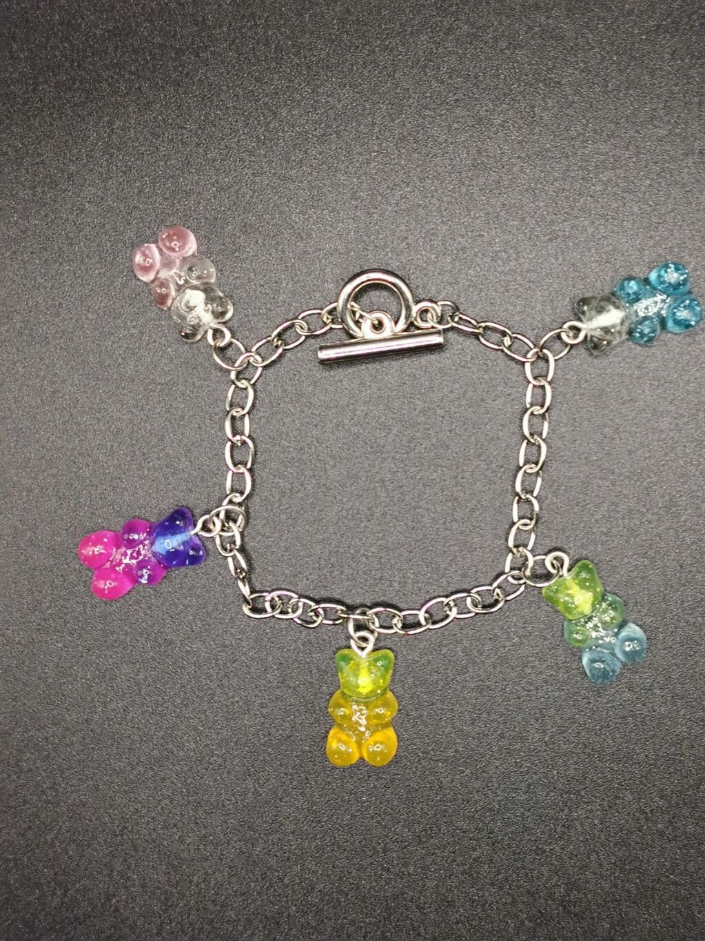 Gummy bear charm bracelet with colorful bears.