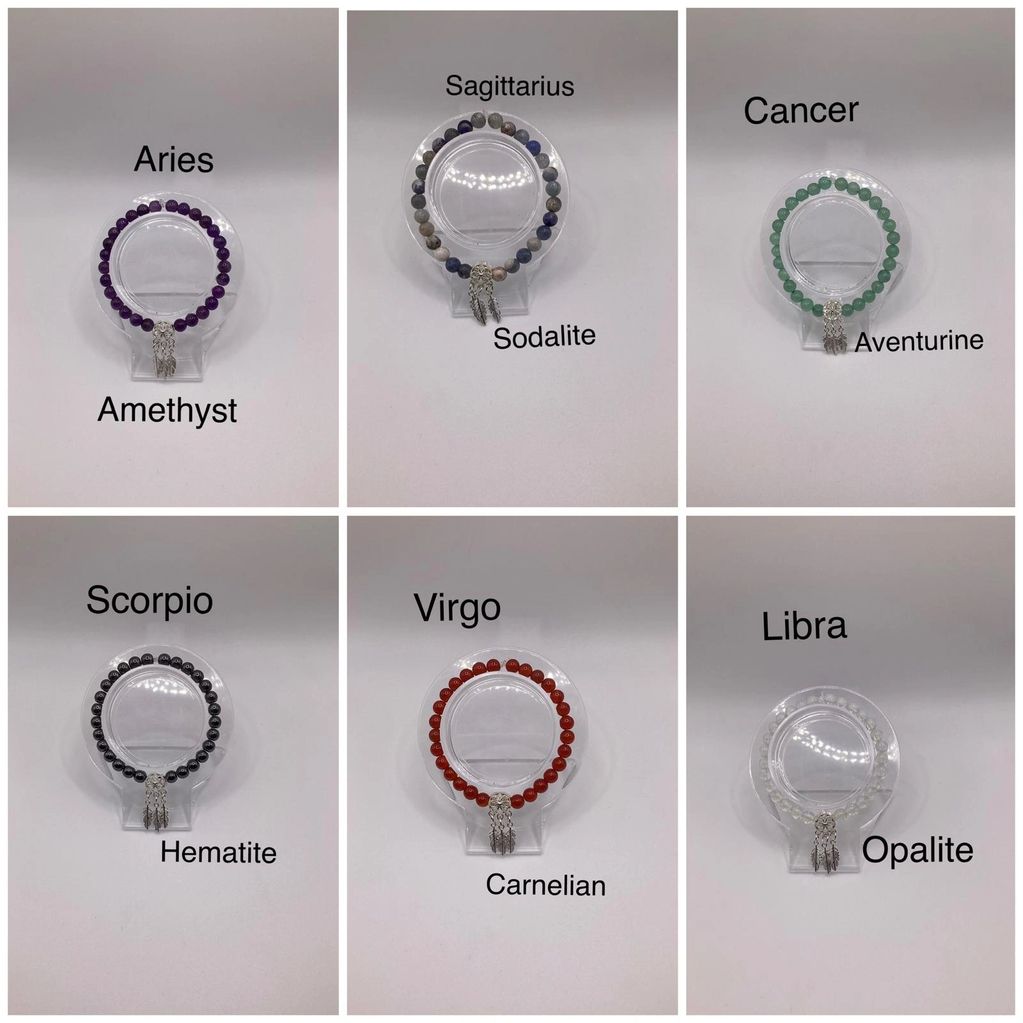 Zodiac bracelets with matching stones.
