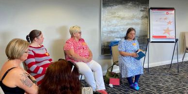 Women engaged in a discussion session.