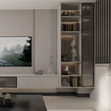 Modern living room with minimalist decor and a wall-mounted TV.