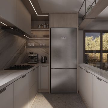Modern kitchen with sleek cabinetry and stainless steel appliances.