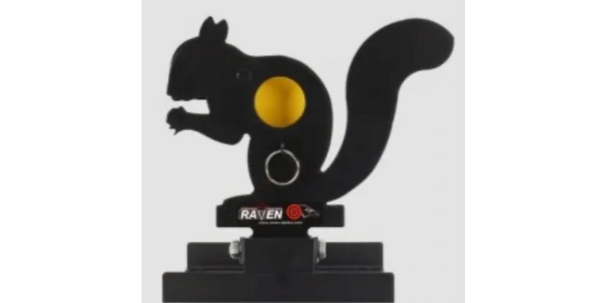 Black squirrel-shaped metal target with a yellow bullseye for shooting practice.