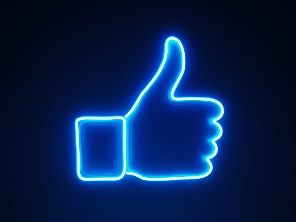 image of glowing blue thumbs up like button