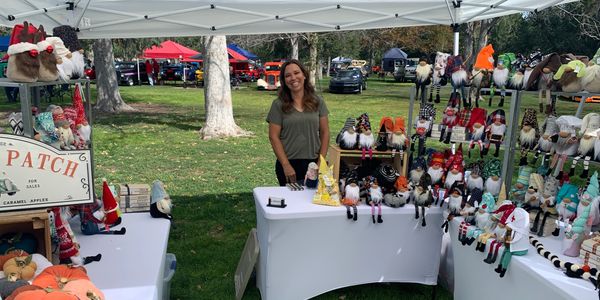 Woman selling crafts at the Copperton Town Days event 2022.