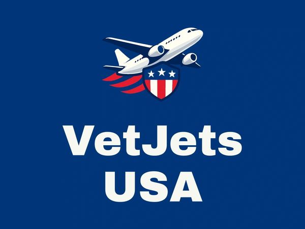 Logo of VetJets USA featuring a jet and patriotic shield.