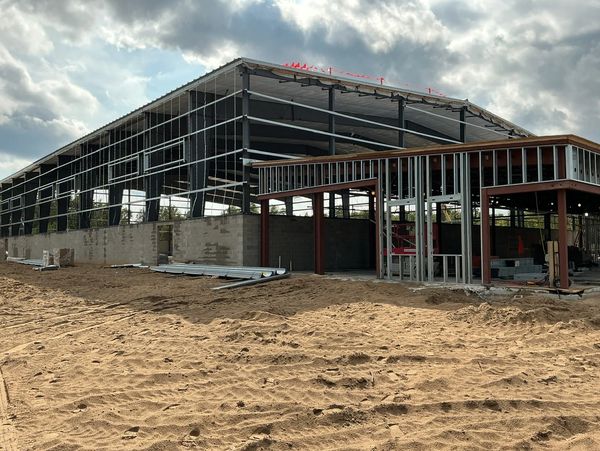 New steel pre-engineered metal building with conventional steel office area