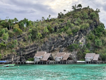 Huts over tropical water