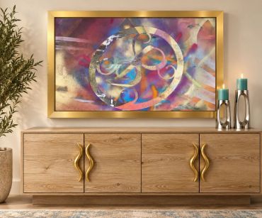 Abstract colorful painting above wooden cabinet.