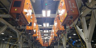 Short-term test boxes pilot run on an overhead carousel for new assembly build