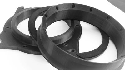 Close-up of black circular plastic rings.