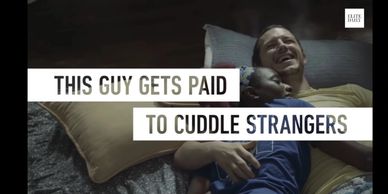 Strangers cuddling for comfort, validation, and relaxation.