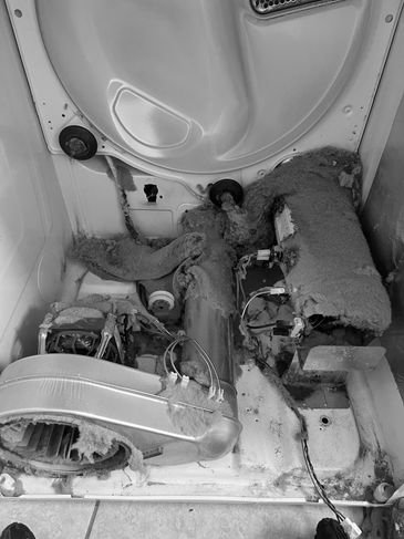 Dirty dryer with a lot of built up lint 